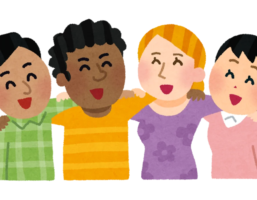 Four students standing with their arms around each other's shoulders, smiling